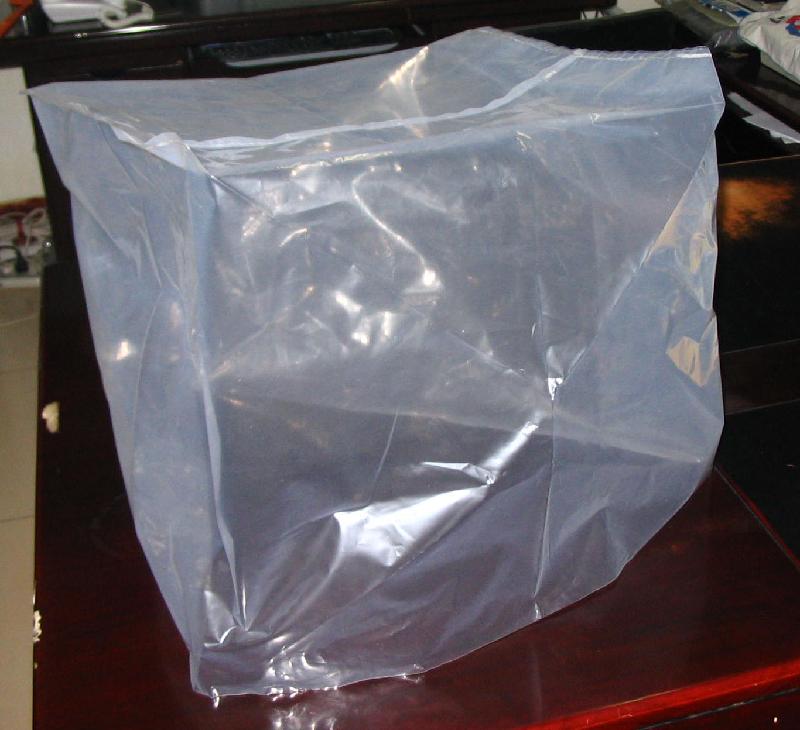 供应山东济南塑料包装袋机器罩衣塑料布