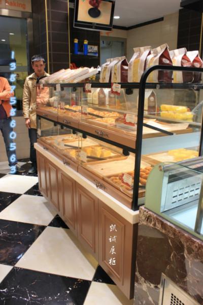 供应高密度板环保烤漆蛋糕面包展示柜食品展示货架大理石吧台收银台
